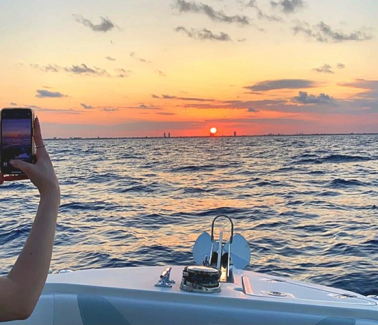 A sunset photo captured from 3 miles into the Atlantic looking west toward the Palm Beach Shoreline