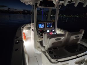 The Bonnie Lee of Sandhill Charters as seen from dark with lighting and electronics lit up